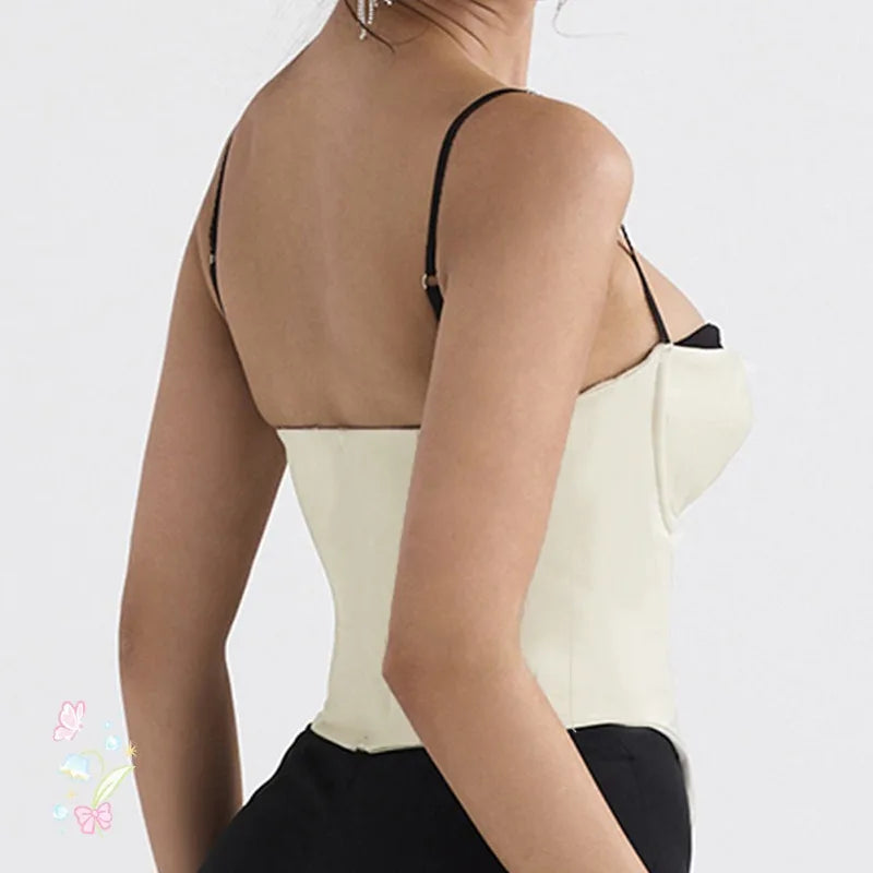 Jasny gorset z czarnymi ramiączkami