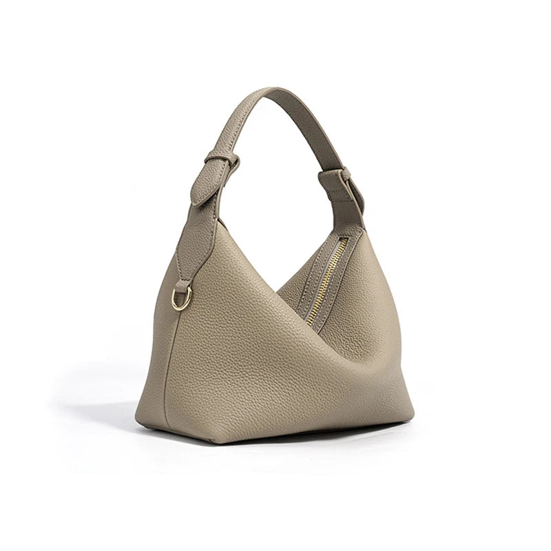 Mała pastelowa skórzana torebka do ręki