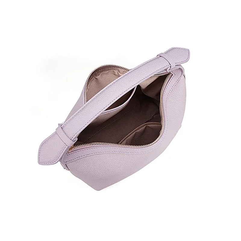 Mała pastelowa skórzana torebka do ręki